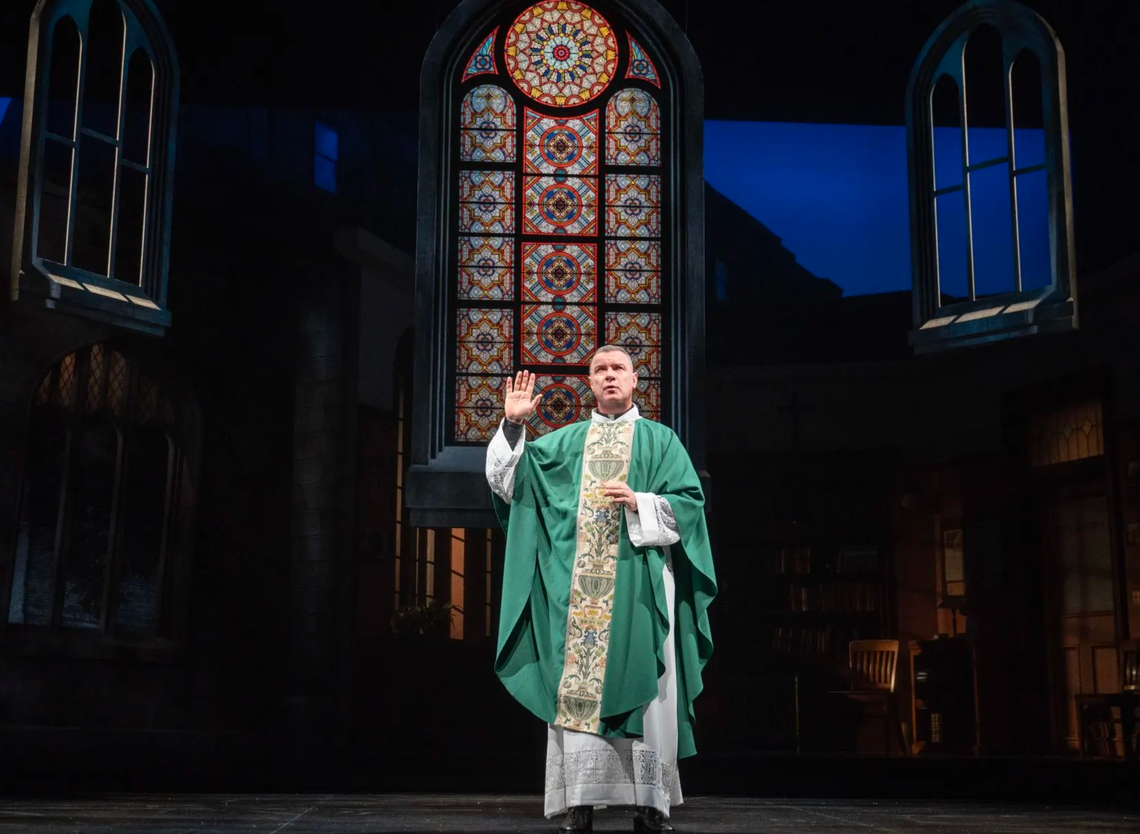 applauding an accused priest....