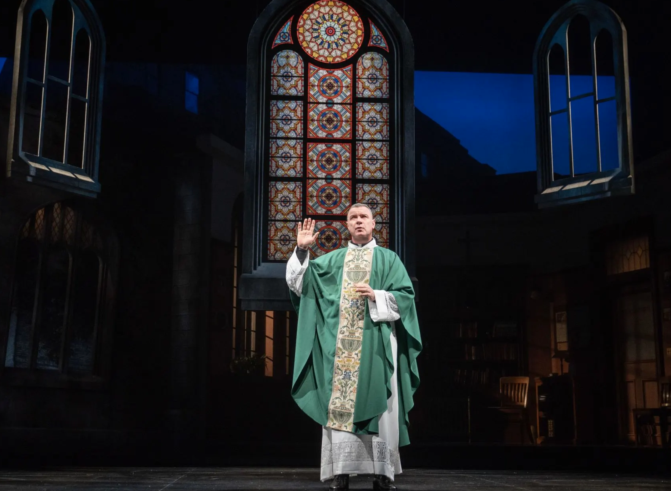 applauding an accused priest....